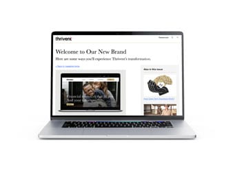 A laptop displays a webpage titled Welcome to Our New Brand from Thrivent, showing a banner image of people hugging and sections about new features and Ways to Win Issues.