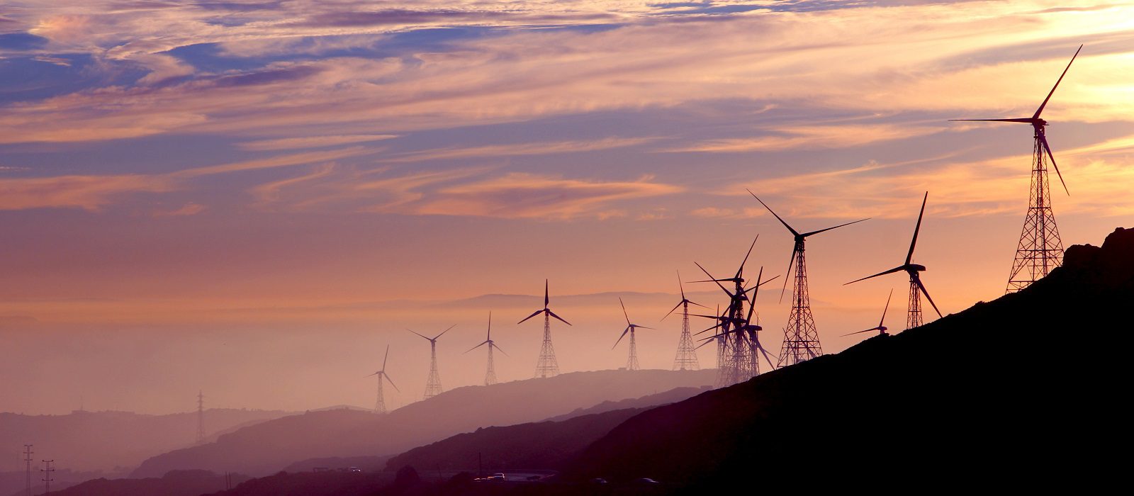 Wind turbines silhouettes. Environment friendly, alternative ren