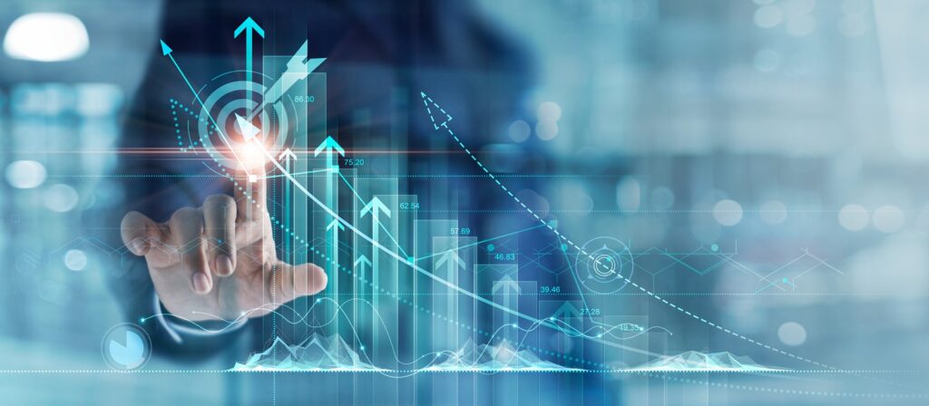 A person’s hand touches a virtual screen displaying upward-pointing arrows, graphs, and data charts, symbolizing growth, success, and futuristic technology in business or finance.