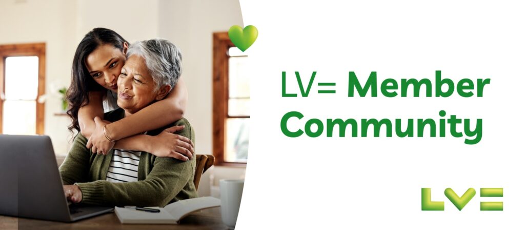A younger woman hugs an older woman who is smiling and using a laptop at a table. The words LV= Member Community and the LV= logo appear next to them on a white background.