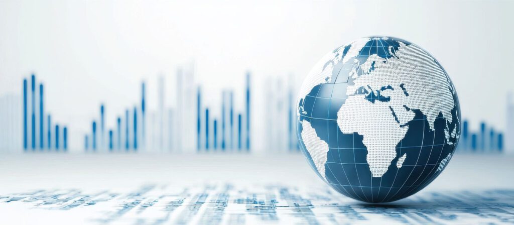 A globe with white continents and blue oceans is shown in the foreground, with blurred vertical bar graphs and financial data in the background, symbolizing global business and analytics.