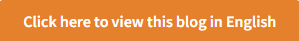 Orange rectangular button with white text that says, Click here to view this blog in English.