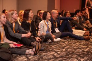 Young people sitting on the floor